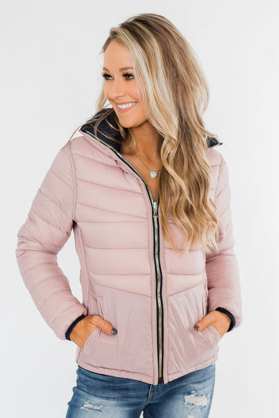 shoppers say this reversible puffer jacket is an affordable